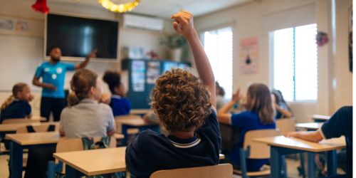 Thumbnail for Middle schoolers engaging with their teacher in class